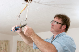 Electrician Straightents Wire