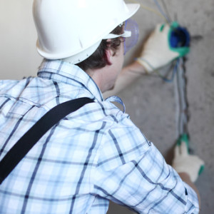 worker puts the wires